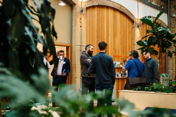 Interior of people chatting and connecting at an event at Elsie Whiteley Innovation Centre.